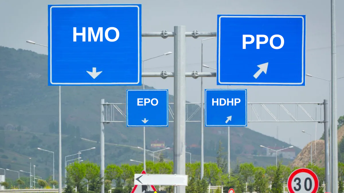 Blue highway signs labeled HMO, PPO, EPO and HDHP pointing in different directions