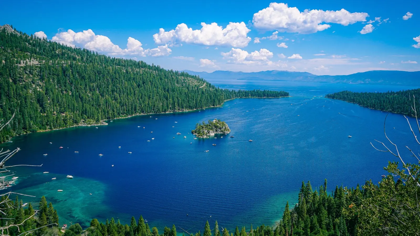 Emerald Bay on the California shore of Lake Tahoe, Fannette Island at its center, pine-covered ridges on both sides